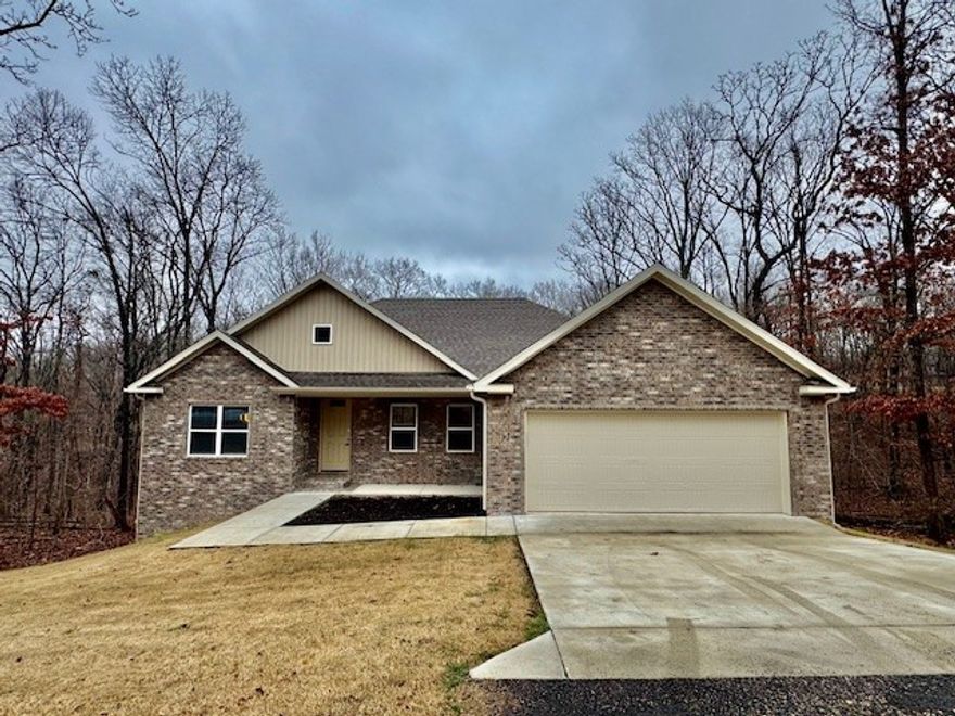 This beautiful 3-bedroom, 2-bath home is nestled in a quiet, peaceful neighborhood just minutes from the heart of Pea Ridge Town Center and located within the highly sought-after Bentonville Schools district. This home features a spacious open floor plan with abundant natural light, a well-appointed kitchen complete with all appliances included, and generous bedroom sizes perfect for families or guests. The primary suite offers a private bath and ample closet space. Enjoy relaxing evenings in the quiet surroundings or take advantage of the nearby outdoor recreation opportunities, including easy access to the renowned Back 40 Trail, ideal for biking and hiking enthusiasts.