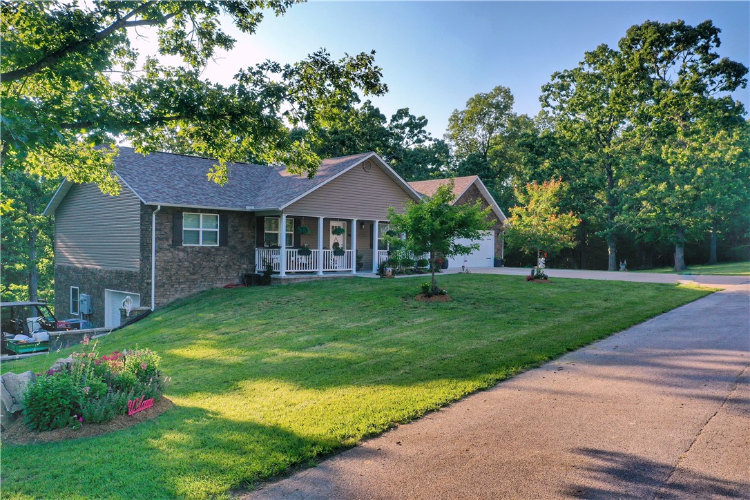 This spacious 4 bedroom 3 bath home was built in 2021 and sits on 3 lots totaling 3.97 acres. Featuring an open floor plan, full basement with a second kitchen and much more. Enjoy country living with modern convenience like a backup generator and storm shelter.
