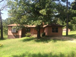 Here is a 3 BR, 2 BA, home with 3.54 Acres m/l, and a storage outbuilding. The land is mostly just trees.