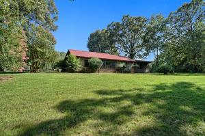 Give me land lots of land!! This 1850 sq foot, 3 bedroom 2 bath home is situated between Dardanelle and Ola on 30 acres that is about half pasture half woods. It is perfect if you want a few cows or horses. If you like to hunt, there are HUGE deer on the property. This little slice of heaven is waiting for you to come enjoy life!