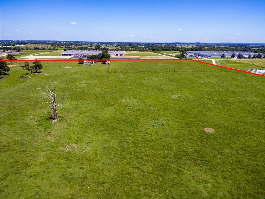 Great Development property City Utilities, property includes brick home with approx. 1987 sf.  Redline in photographs indicates property lines. They are not exact.