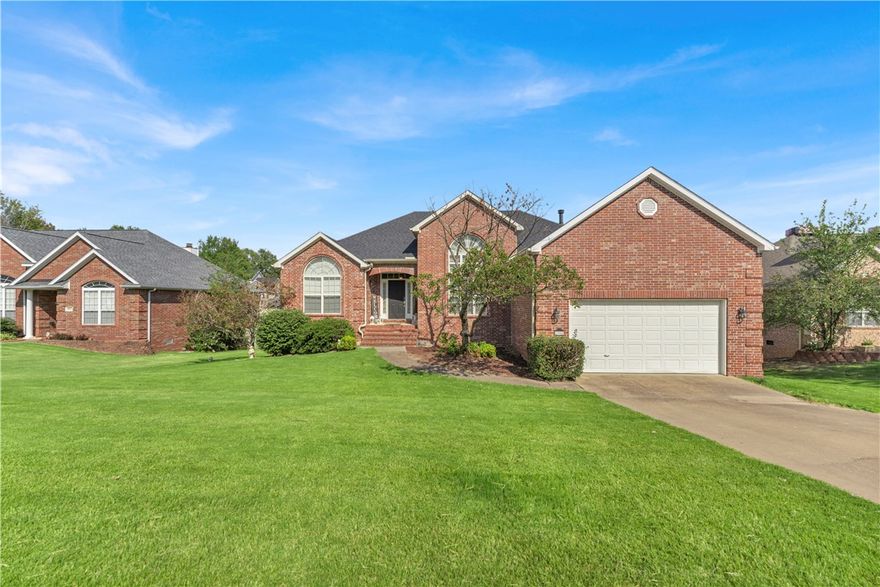 Beautiful 5-bedroom home with 2 living areas and easy access to I-49. Updated kitchen features gorgeuos cabinets, granite countertops, and stainless steel appliances. Wood floors flow from the entry to the formal dining room, kitchen, and eat-in area. The primary bath has been updated with a soaking tub, tiled walk-in shower, and granite countertops with undermount sinks. Guest baths have also been remodeled with tile floors, granite, and undermount sinks. Enjoy outdoor living on the great deck and covered patio, plus a third garage bay in the back for storage or a workshop.