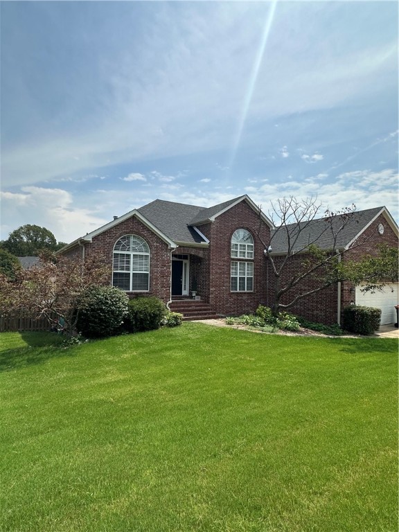 Beautiful 5-bedroom home with 2 living areas and easy access to I-49. Updated kitchen features gorgeuos cabinets, granite countertops, and stainless steel appliances. Wood floors flow from the entry to the formal dining room, kitchen, and eat-in area. The primary bath has been updated with a soaking tub, tiled walk-in shower, and granite countertops with undermount sinks. Guest baths have also been remodeled with tile floors, granite, and undermount sinks. Enjoy outdoor living on the great deck and covered patio, plus a third garage bay in the back for storage or a workshop.