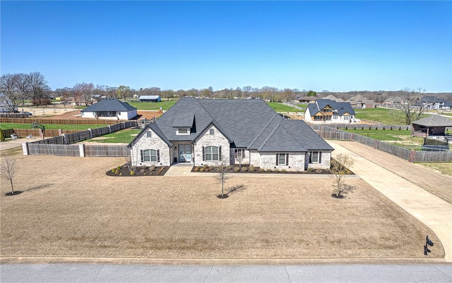 Looking for a home with sophisticated contemporary style? Look no further! This gorgeous home features 5 bds/4.5 baths, study and bonus room. Open floor plan is perfect for entertaining. Kitchen is a chefs dream with 13 foot island/bar, built in refrigerator and double oven and gas cooktop. Master bath is a dreamy oasis with large walk-in shower, soaker tub, ample built-in storage and enormous walk-in closet. Custom built-ins in the dining room offer stylish cabinets, wine storage and two wine/beverage refrigerators. Enjoy spending your time in the backyard, entertaining by the custom heated salt water pool by OAK and cooking delicious diners at the outdoor grill all while having tons of extra room to run and play! Home is wired for sound indoor and outdoor with speakers, Nest thermostat, has USB outlets in bedrooms and kitchen, Wemo smart light switches, and master has its own heating and air. Come and get it while it lasts and never want to leave home again!