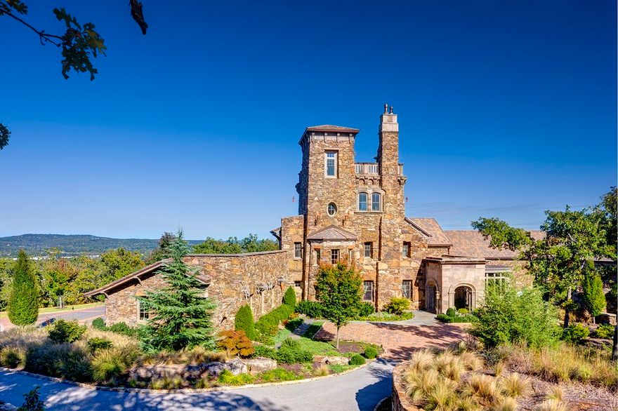 The Dromborg Castle, A State Treasure, featuring 3 levels, 5 bedrooms, 4.5 bathrooms, and stellar views! This home sits on +/- 34 Acres and features a pond with perch and catfish and a Small in-ground pool that has a potential to be heated. The flow of the Great Room, into the Kitchen is perfect if you like to cook while entertaining. A 1 car garage is also featured right off the Kitchen, making it easy to carry the groceries from the car straight into the kitchen! The Master Bed/Bath and 3 other bedrooms can also be found on the main floor. Get away from the crowd and head up to the 2nd floor family room for some quiet. The 2nd floor also features a bedroom, bathroom, and kitchenette. Ready to watch the sunset after a busy day? Head on up to the 3rd floor observation deck for the BEST views! Radiant floor heating throughout to help keep you nice and warm during the cold winter months. Live in a castle, build a spa/retreat, or turn it into a must-book event space! The possibilities are endless!