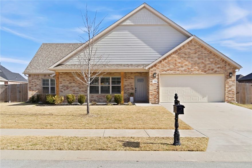 You will fall in love with this open-concept floor plan from the moment you walk in. The floor plan has 3 bedrooms, 2 baths, and 1,962 sq ft of well-designed living space – all on one floor. The common area has vaulted ceilings, granite countertops, white cabinets, gas fireplace, and hardwood floors. The spacious primary suite includes tray ceiling, walk-in shower, soaking tub, and a nearby laundry room for convenience. Tons of natural light fills the home, creating a warm and inviting feel throughout. The split floorplan has 2 guestrooms and full bath. Step outside to a covered patio and fully fenced backyard, perfect for quiet evenings. Neighborhood amenities include a resort-style pool and playgrounds, perfect for getting to know your neighbors. This property is move-in ready. New roof, gutters, and garage door in 2025. Enjoy everything NWA has to offer with plenty of popular restaurants and shopping to choose from. Open House Sunday, February 15th 2-4 p.m. Lender credit provided by First Colony Mortgage.