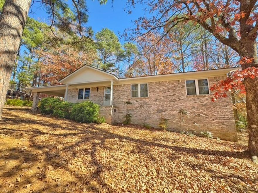 Welcome to 147 Memory Lane, A well maintained 3 bed, 2 bath home on 1.24 acres with all the extra space you’ve been looking for. With 1,484 sq ft on the main level plus a walk-out basement for additional storage, this one gives you room to breathe. The home features a metal roof, a cute covered front porch, and a large two car carport to keep you out of the weather. Inside, you’ll find a comfortable layout, a cozy wood-burning fireplace, and easy access to the outdoors. Need workspace? You’ll love the 468 sq ft detached shop, perfect for projects, hobbies, or extra storage. Property is on city water and sewer, giving you the convenience of town with the space of country living. A solid, well cared for home with land at an affordable price. Come see it in person and imagine the possibilities!
