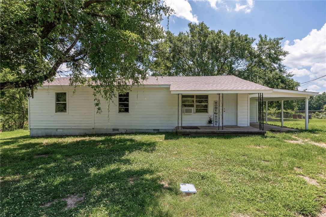 Ready for small town living and a little country! Then here's the place for you! This cute 3 bedroom, 2 bathroom home has been updated with a brand new roof, flooring, paint, light fixtures, bathroom and kitchen makeovers, water heater and electric cookstove.
The home has two window air units and an infrared gas wall heater. You'll also enjoy having a storage building and a storm shelter. Great location being not far from town and I-40.