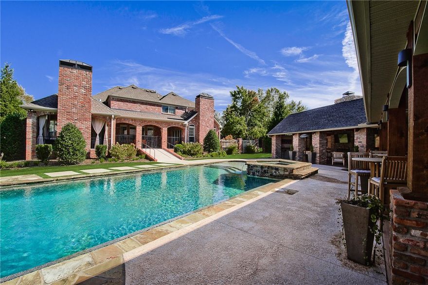 Beautiful & Elegant Estate Home in Highly Sought Out Pinnacle Golf & Country Club.  This Home is Great for Entertaining w/Fabulous Outdoor Living Area w/Outdoor Fireplace, Gorgeous Heated Pool w/Hot Tub, Waterfall, Pool Bathroom & Exercise Rm.  This Estate Home Offers a Detached Pool House w/its own European Kitchen & Bedroom & Full Bathroom & Living Area & Laundry Rm.  Main House offers Versatile Floor Plan w/Cozy Family Rm off of the Kitchen and Formal Living Rm w/High Ceilings & Full Views of the Pool, Elegant Dining, Private Office w/French Doors, Hardwood throughout Main Level, High Ceilings, Beams, Bonus Upstairs, Master on the Main, and Large Size Secondary Bedrooms on 2nd Level. In-Law Apartment/Pool House Has 1,500 sf (923 heated and cooled and 700 covered) of Living Area.  Located in Bentonville Schools District & All the Amenities the Neighborhood has to offer. Don’t Miss Out !! Fantastic Price for this Estate Home !!