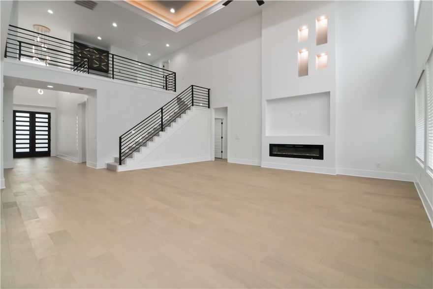 STUNNING NEW CONSTRUCTION HOME, completed in Jan 2026 , offers the perfect blend of modern design and everyday comfort. Featuring 4 bed, 4.5 bathrooms, and a spacious 3-car garage, the 3963 sq ft layout showcases an open-concept floor plan adorned with elegant engineered wood throughout. The heart of the home is a beautifully appointed kitchen with quartz countertops, ample workspace, and stainless steel appliances ,all overlooking the expansive family room, ideal for entertaining guests or relaxing with loved ones. As you enter, you'll be captivated by the soaring 20’ Tray  ceilings that add a sense of grandeur and openness. The primary suite is generously sized and includes a luxurious bathroom with a walk-in shower, storage and a spacious walk-in closet designed to accommodate both partners' essentials. Outside, the backyard offers plenty of room for outdoor enjoyment or future customization. Home features black windows, 8’ doors in first level, media room, wet bar, loft and many more upgrades.Must See!!