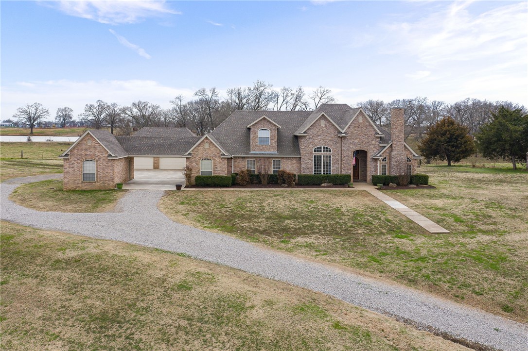 Custom built home on 5 acres just minutes from Alma or Van Buren. Majority of the downstairs is hardwood flooring w/ tile in all wet areas. Kitchen features granite tops, 2 sinks, double oven, hidden walk-in pantry. HUGE master suite with every amenity: Walk-in shower with 2 heads, hand spray & body sprays. Whirlpool tub, separate vanities, U-shaped walkthrough closet. Formal dining plus office. One of the guest rooms has private full bath & walk-in closet. Bonus room w/full bath. 3 car + attached garage.