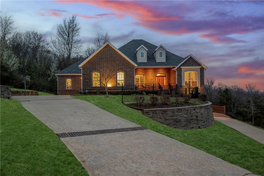 Super Special , Hard to find, fabulous 6 bedroom , 4 1/2 bath home with lots of space to roam with Exquisite VIEWS . 2 covered decks. A Sauna, Designer Fire-pit nestled in the back yard. Coveted Fayetteville Country Clu is around the corner. Home has recently refinished Solid Wood Oak floors, new carpet & recently painted interior. All New HVAC 2023, New roof ( 15 month old), New (high end) Dishwasher, new Hot Water Circulating Pump and all new toilets throughout.There is a fabulous dedicated Office/ Library on Main level along with 4 bedrooms, 3 1/2 baths. A wonderful eat-in Kitchen and large open living den/dinning. Down stairs:High Ceilings, Lots of windows and bright light streaming in with 2 bedrooms, full bath, Wet bar, game room/movie room, gas fireplace, covered patio with exterior back door giving access to back yard & fire pit. Down stairs also includes sunroom (currently used as exercise room) w/open air deck w/another gorgeous view the 4th garage space used as golf cart storage.New Gutters/leaf guard