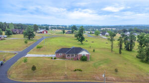 Don't miss this Gorgeous 3 bedroom 2 bath home sitting on 1.26 +/- Acres in the Whorton Mtn Estates private subdivision. This home features trey ceilings, walk in closets, large kitchen and a beautiful covered outdoor area for entertainment. In addition this home also includes a storm cellar and extra storage under the house. Schedule your showing today!