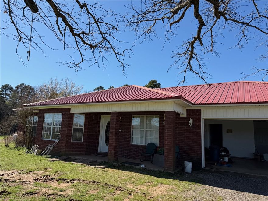 Nice home on 17.90 acres +/- plus a shop.