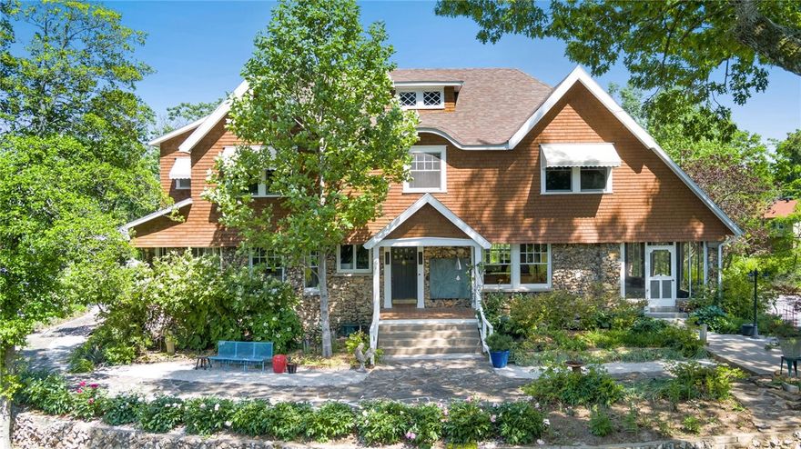 Own a piece of Rogers history! Built in 1904, this beautifully preserved home sits on 2.69 acres and was once the residence of O.L. Gregory and his wife, Atalanta, the very namesake of Lake Atalanta. Gregory donated the lake's land to the city with one request: it be named in honor of his beloved, considered the
Just minutes from Lake Atalanta, downtown Rogers, Marina, this historic gem offers 3,859 square feet of living space with 4 bedrooms, 2.5 aPhs, and timeless architectural details throughout. The property also includes a 937-square-foot carriage house with approved plans for a 1-bedroom, 1-bath guest suite and spacious great room-ideal for extended family, rental or a private studio. The grounds are professionally landscaped and have beautiful mature trees. A rare opportunity to own a legacy property in the heart of Northwest Arkansas.