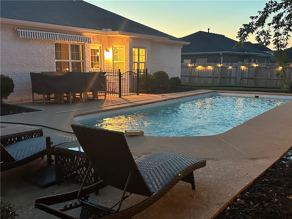 This beautifully updated "Move In Ready" home is the best of both worlds. All brick, split 3 bedroom, 2 bathroom, open floor plan home located in Windwood Subdivision. Great location - convenient to everything. If you decide to stay home, you can relax or have some fun in your very own beautiful in ground pool right in your own backyard! Close to trails, schools, restaurants and markets. Near Osage Park, Thaden Field and Bentonville Community Center. Just moments from downtown Bentonville or Centerton. HVAC new in 2022. Come see it today!!
