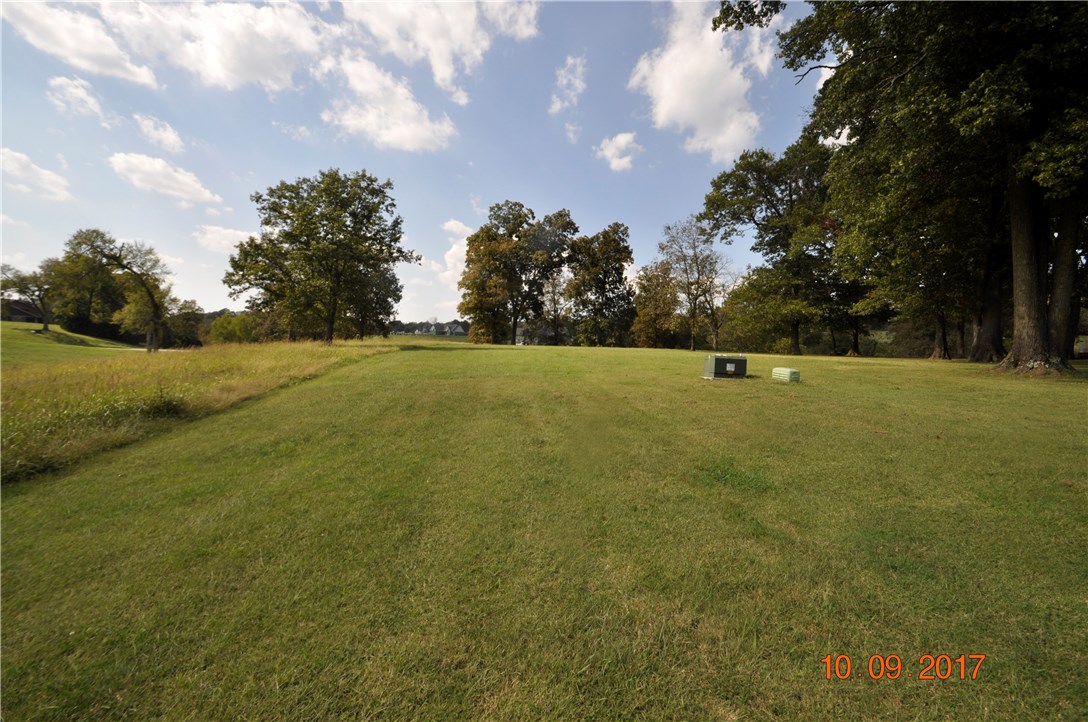 BEAUTIFUL 2 Acre lot in an upscale subdivision