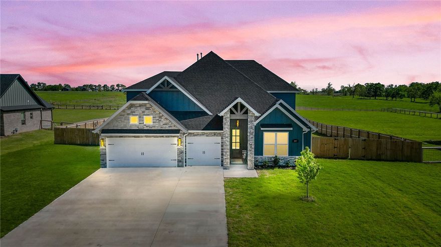 Welcome to Jenna Estates, where modern comfort meets peaceful acreage living just minutes from town! This like-new, stunning home showcases 4 bed, 3.5 bath, and over 3000 sqft of thoughtfully designed living space on a spacious 1.06-acre lot that is fully fenced, perfect for privacy, pets, and outdoor living. Start your mornings with coffee on the inviting back porch, soaking in serene country views. Inside, enjoy a full custom-built with custom cabinetry, upscale finishes, spa-like bathrooms with tile-to-ceiling showers, & two fireplaces that add warmth and elegance. The open layout is ideal for everyday living and entertaining, while the bonus room upstairs offers flexible space for a media room, office, or guests. Thoughtful upgrades and quality craftsmanship make this luxury home truly move-in ready. Ideally located just 11 miles from Bentonville, about 17 mins from Walmart HQ and near the Bella Vista Bypass with quick access to I-49, blending a sought-after country feel in a prime Northwest Arkansas location.