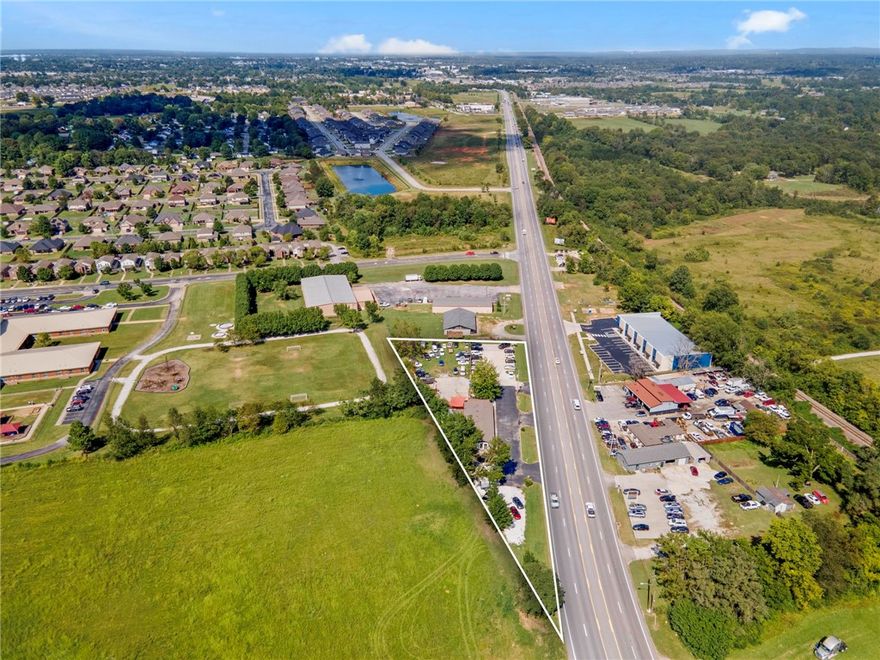 Prime C-2 Commercial Property on Hwy 71B! Offering 27,000+ vehicles daily, this property provides unmatched visibility and exposure in one of Lowell’s most active corridors. Just minutes from I-49, it sits at the center of rapid residential and commercial growth, surrounded by thriving businesses and strong demographics. With excellent frontage, easy access, and a highly desirable zoning designation, this site is perfectly positioned for retail, office, or service-based businesses looking to expand and succeed in Northwest Arkansas.