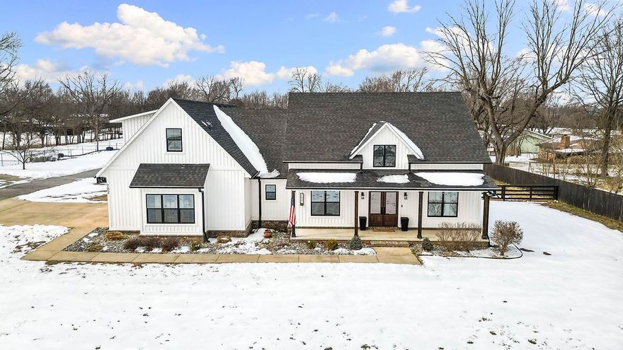 This beautiful home blends quality and comfort in a desirable location within walking distance of schools and parks. Offering 2,611 s.f., the split floor plan provides both privacy and great family space. The open-concept layout features a large kitchen with walk-in pantry, perfect for entertaining. Situated on a 1.02-acre lot, enjoy a fenced backyard, two covered porches, and a fire pit with hanging benches. The newly built shop is a boat owner's dream. A must-see property!