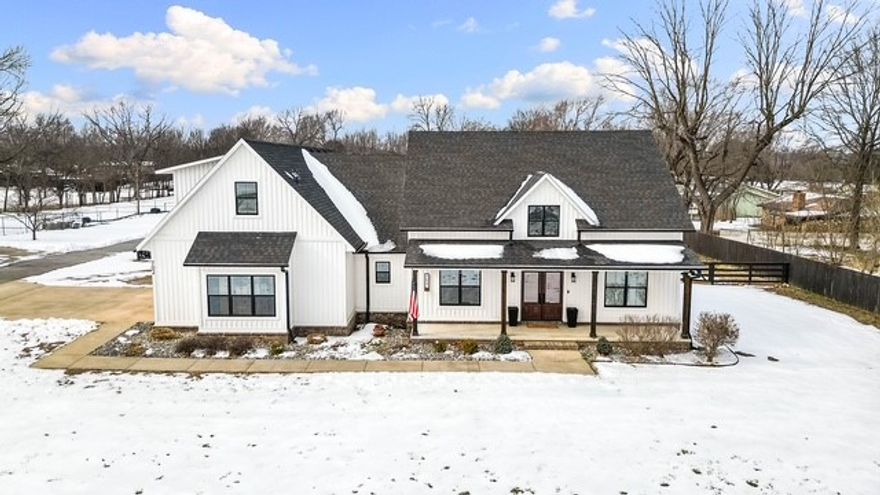 This beautiful home blends quality and comfort in a desirable location within walking distance of schools and parks. Offering 2,611 s.f., the split floor plan provides both privacy and great family space. The open-concept layout features a large kitchen with walk-in pantry, perfect for entertaining. Situated on a 1.02-acre lot, enjoy a fenced backyard, two covered porches, and a fire pit with hanging benches. The newly built shop is a boat owner's dream. A must-see property!