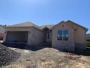 NEARLY COMPLETE--MAKE YOURSELF AT HOME in this lovely 3 BR, 2 BA brick home featuring spacious kitchen with beautiful granite countertops and a pantry, hardwood flooring in the living room and carpet in bedrooms. Features a well-designed master suite with separate tub and shower. Walk-in closets in all three bedrooms!