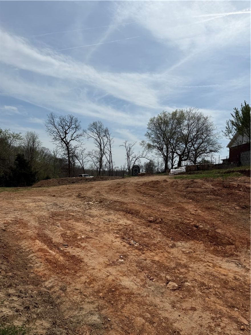 Build your dream home on this 1 acre corner lot located off HWY 62. Minutes away from Downtown Rogers with easy access to Beaver Lake.