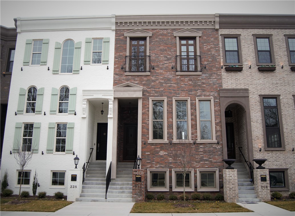 Enjoy the lifestyle & culture of downtown living a short distance from shopping, restaurants, & events. Pick your finishes in Downtown Bentonville's prestigious Brownstones. These luxurious townhomes feature an amazing layout throughout three levels. An English basement provides a great multi-purpose space with a bedroom and full bath that can be used as a guest suite or a home office. The main level is the living space and is perfect for entertaining with 15 ft ceilings, large windows, and an open layout between the kitchen, dining, and living space. Master bedroom has 10 ft ceilings and an attached master bathroom. Large balcony is ideal for relaxing and enjoying the downtown views. Two guest bedrooms on upper level provide plenty of space. Exquisite high-end finishes such as Pfister brushed nickel plumbing fixtures, white quartz countertops, & gray custom shaker cabinets. White natural stone backsplash with cement tile accent in kitchen. For a private tour, call the listing team today!