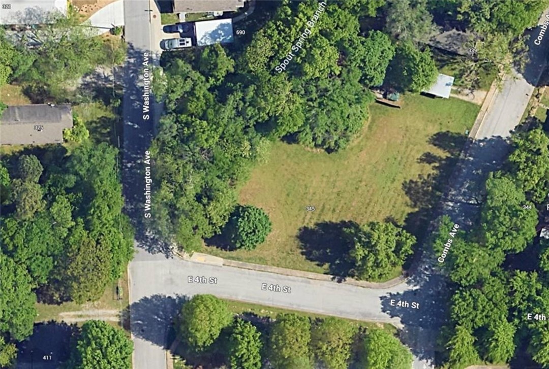 Rare opportunity to own three build-ready lots in the heart of downtown Fayetteville. Just walking distance to the Square and Dickson Street, this property has already been approved by the city for a lot split. The sale includes a full survey (see attached) and three custom house plans, ready to go. Reach out for house plan details and take advantage of this turnkey infill development opportunity.