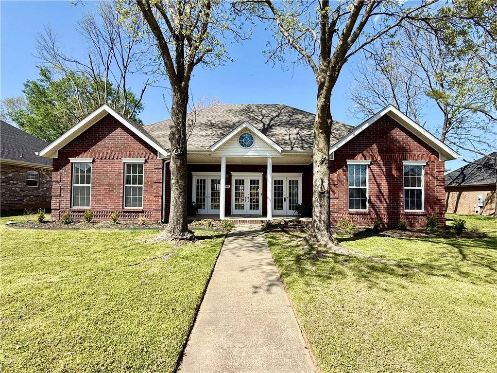 Great Bentonville location in Orchards Subdivision. This spacious 3 br 2 bath home with a large bonus room on 2nd level could also be used as a bedroom with a walk in closet. 3 french doors to the front of the house adds abundance of natural lighting. Enclosed sunroom. Whole house has been painted and new Luxury Vinyl Plank installed. Close to schools, shopping, restaurants and bike trails. In ground diving pool with liner, currently winterized. A small pool-house or playhouse in back yard. Refrigerator to convey. New roof just went on in September 2024. New Landscaping in front! Sprinkler system not guaranteed.
