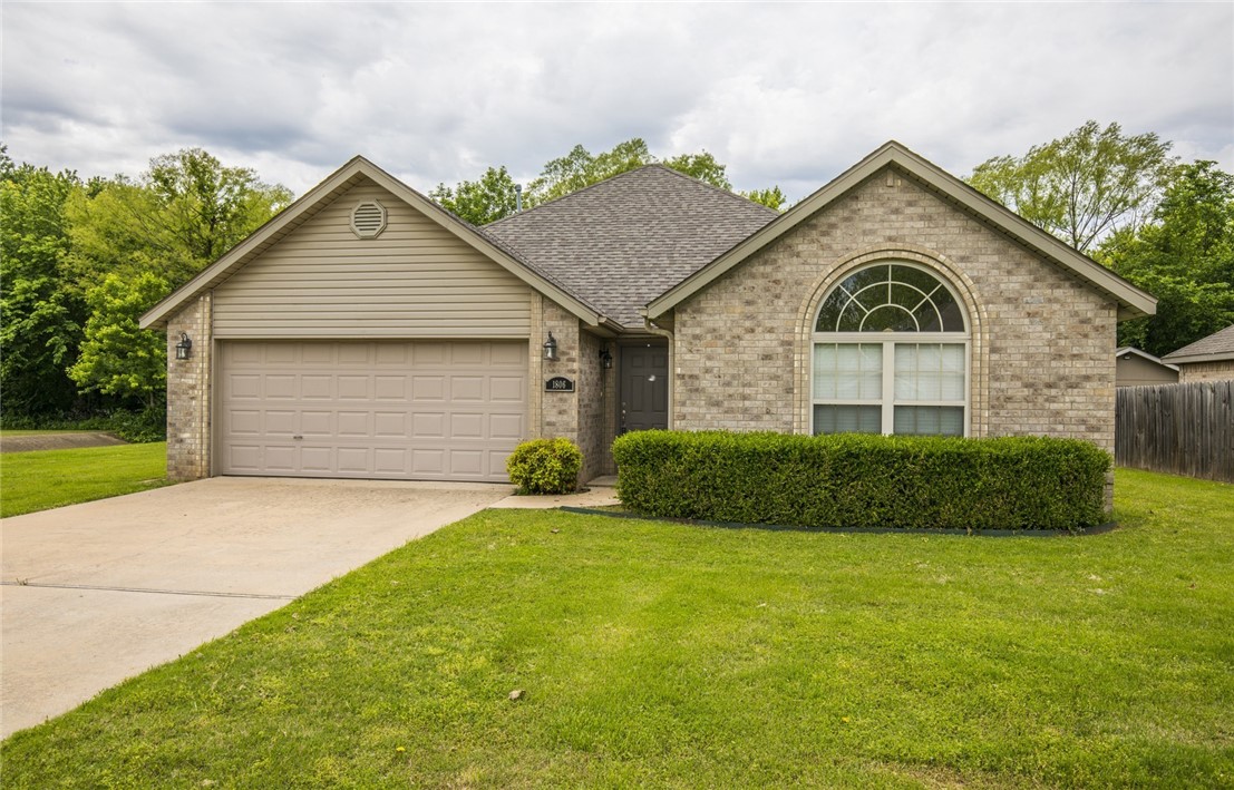 Lovely home in Bentonville, close to everything. This 3 bedroom 2 bath home has open floor plan, new carpet, gas log fire place in living room, master bath has separate jetted tub and shower, double vanity. Home includes refrigerator, washer/dryer and lawn care. Covered patio. Back yard has wooded area behind it. Awesome trails right outside your door.