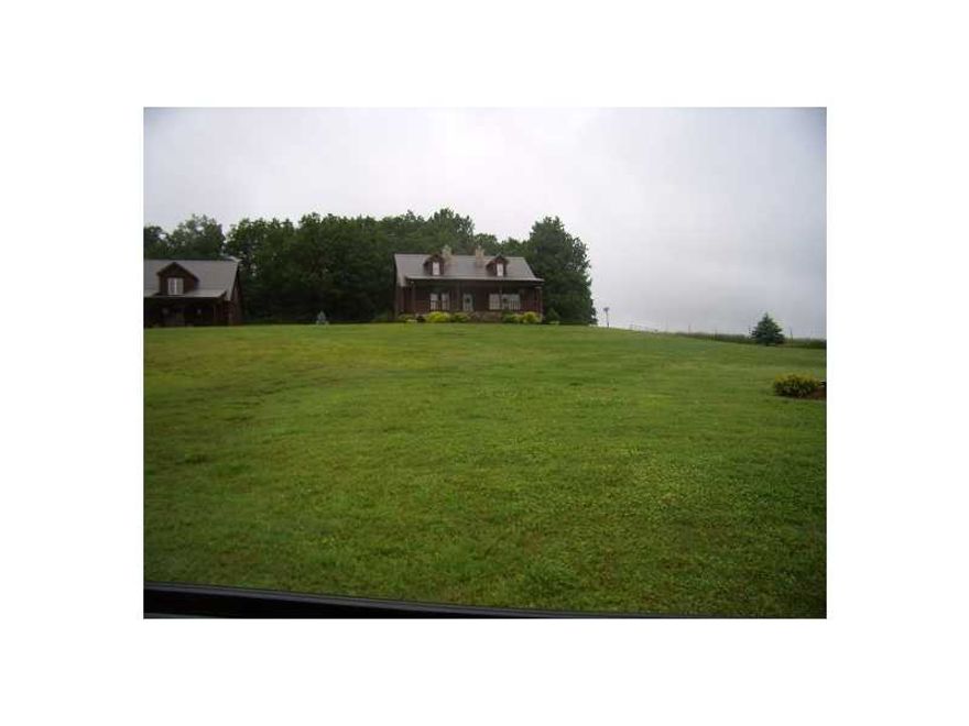 Beautiful ranch with tremendous views, lovely log sided home, easy access, fenced into 7 pastures, 8 ponds, 2 year round springs, loaded with deer and other wildlife, a tremendous place to call home!!!!