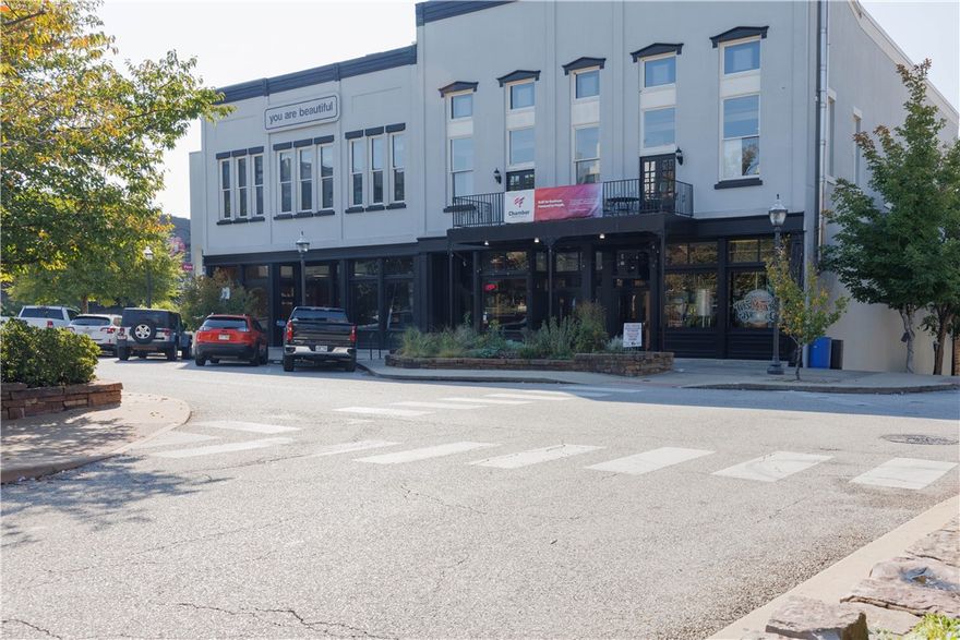 Prime downtown Fayetteville location steps from the Historic Square! This charming commercial space at 21 W Mountain Street offers unbeatable visibility, steady foot traffic, and proximity to popular restaurants, boutiques, and the Farmers Market.