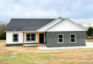 This brand-new home is just about ready for its new family! It features 3 bedrooms and, 2-bathrooms among the 1,378 sq ft, and offers stylish living in a serene country setting! Enjoy the peace of nature with the convenience of being close to town. Thoughtfully designed with a spacious open layout, this home features a modern kitchen, a walk-in pantry, and a dedicated laundry room. The primary suite offers a private retreat, and the two additional bedrooms are perfect for family or guests. Step out to the back deck overlooking the woods--a perfect spot to unwind. This home blends comfort, style, and practicality with a two-car garage. Don't miss out on this one, call to schedule your showing today!