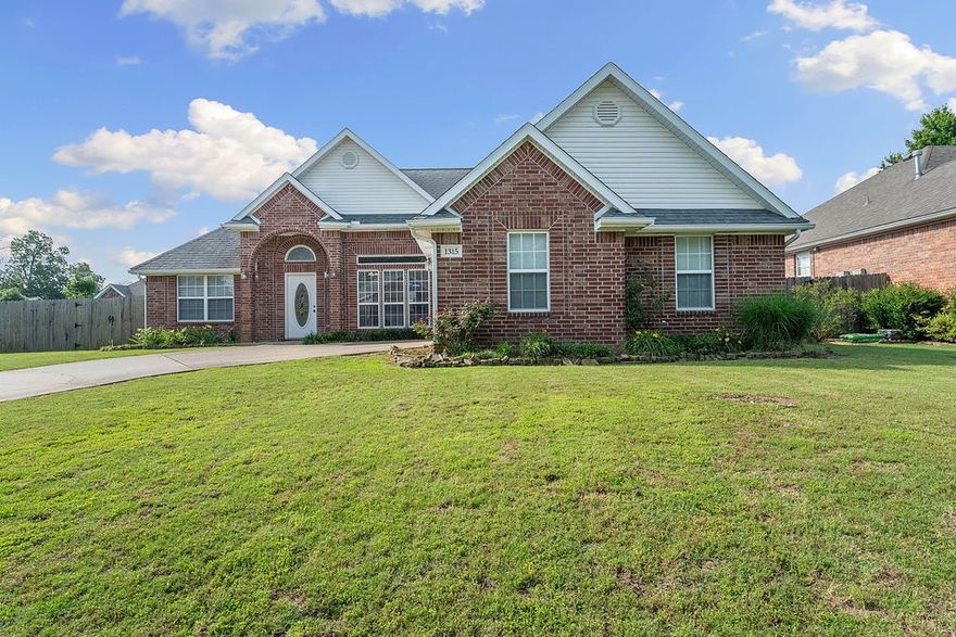 This lovely all-brick home is located in the Breckenridge subdivision near Lake Atalanta park in Rogers. Upon entering are the formal dining room and large living room that feature high ceilings, beautiful crown molding and a gas fireplace. The kitchen opens to the breakfast nook and living room, providing open-concept living. Throughout the home you will find large windows allowing for tons of natural light. The large primary bedroom features a spacious ensuite bathroom and walk-in closet. Across the house are two additional bedrooms and guest bathroom. Located on a corner lot, there is a spacious backyard with large patio, great for outdoor enjoyment. The beautiful Lake Atalanta Park and trails are located a short distance from the neighborhood.