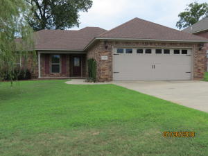 4 bedrooms (4th is office or bedroom), 2 baths,open/split floor plan,granite kitchen counter tops,glass tile backsplash,custom cabinets w/soft close doors,pantry w/built in shelves,crown molding,bamboo floors in main living area,stained concrete in office and bathrooms,master bath to include jetted tub,separate shower,walkin closet,low E windows and foam insulation in attic for low utility bills, privacy fence. Washer,Dryer, and refrierator to convey.