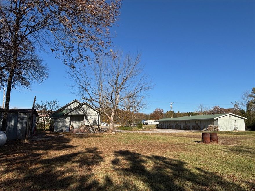 Home and income possibilities come with this house and 5-unit motel with opportunities for a beauty salon, office, etc. Total Square footage for Home/Salon/Motel is 3113 Sq. Ft. Two bedroom home could be converted to three bedrooms.  Small shed for a workshop, storage, etc. Pretty park-like yard with room for your toys. Great location in small town on US Hwy 65 in the heart of the Buffalo National River country. Within 15-30 minutes of multiple landings on the river. Within an hour and 10 minutes of Bull Shoals, Table Rock, Taneycomo, Norfork and Greers Ferry Lakes, and the White and Little Red Rivers.  Located within minutes of numerous camping, hiking, canoeing, hunting and sightseeing venues. Come check out this property offering a home and income stream opportunities! All #'s approximate. Acreage and age are estimates.