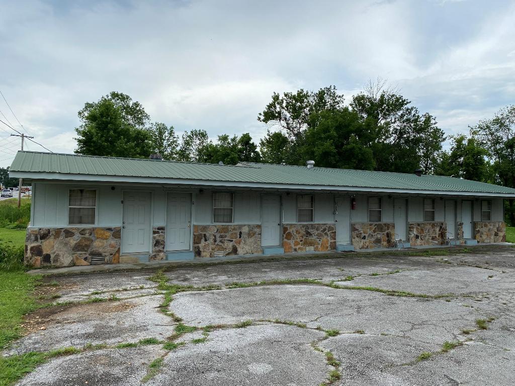 Home and income possibilities come with this house and 5-unit motel with opportunities for a beauty salon, office, etc. Total Square footage for Home/Salon/Motel is 3113 Sq. Ft. Two bedroom home could be converted to three bedrooms. Small shed for a workshop, storage, etc. Pretty park-like yard with room for your toys. Great location in small town on US Hwy 65 in the heart of the Buffalo National River country. Within 15-30 minutes of multiple landings on the river. Within an hour and 10 minutes of Bull Shoals, Table Rock, Taneycomo, Norfork and Greers Ferry Lakes, and the White and Little Red Rivers. Located within minutes of numerous camping, hiking, canoeing, hunting and sightseeing venues. Come check out this property offering a home and income stream opportunities! All #'s approximate. Acreage and age are estimates.