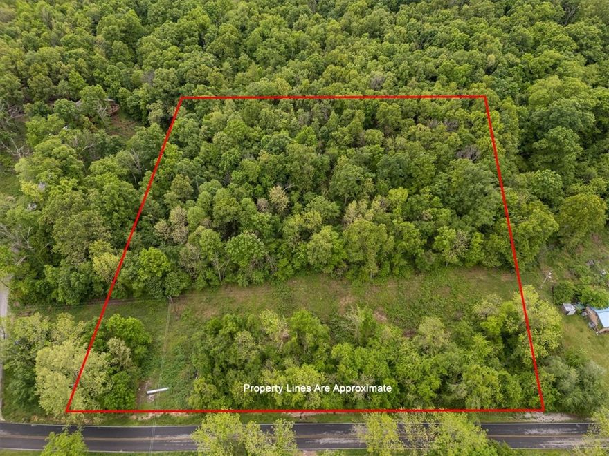 Beautiful acreage offering endless possibilities, located just over a mile from Highway 412 with all paved road access to the property! Whether you're looking to build your dream home, start a hobby farm, or invest in land, this property provides a great opportunity. Enjoy the peaceful setting with convenient access to nearby amenities. Utilities including gas and electric are available at the road, onsite well and septic needed (buyer to verify). Don’t miss your chance to own a piece of the countryside! Discover 3.6  acres just outside the city limits of Siloam Springs, offering the perfect balance of privacy and convenience. Only 10 minutes to historic downtown Siloam Springs, 25 minutes to I-49 and Springdale, and approximately 13 minutes to the new 612 Bypass upon completion. Country living with shopping and restaurants just minutes away!