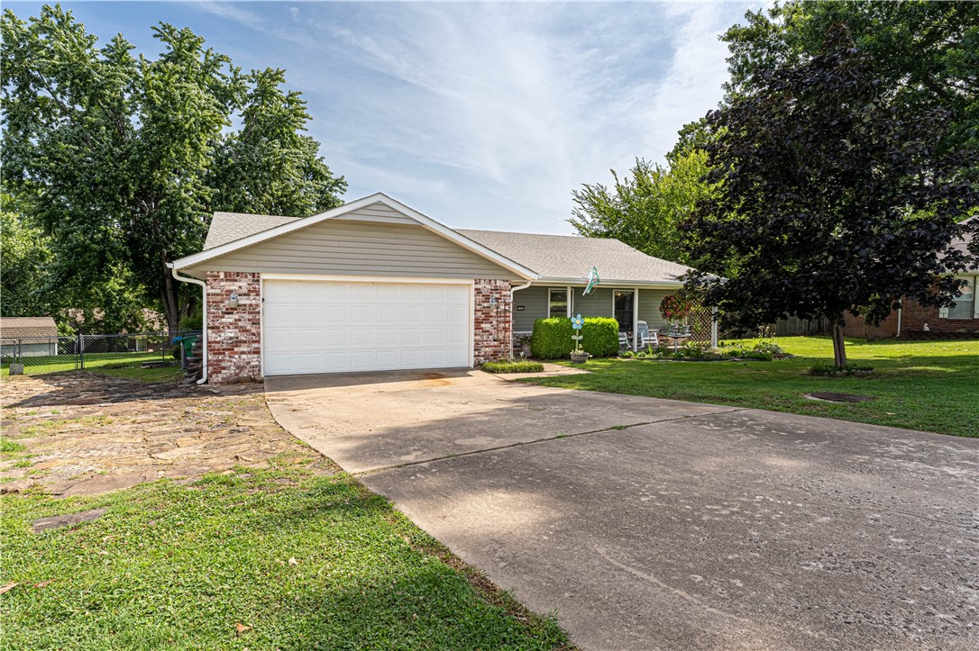 Move in ready! Charming 3 bedroom 2 bath home located in a quiet Springdale neighborhood near Central Jr. High and Smith elementary. This home features a huge primary bedroom with very large primary bathroom, vaulted living room ceiling, big eat in kitchen, great deck with mature shade tree, two car garage and much more. Many up dates in the last 8 years, HVAC 2019, roof 2015,water heater 2018, garage door opener and springs 2019, garbage disposal and LVP throughout 2022. Great curb appeal and a big, fenced back yard. Hard surface on west side of home to accommodate a 32ft RV or trailer. Pool does not convey. Check out this fabulous home.