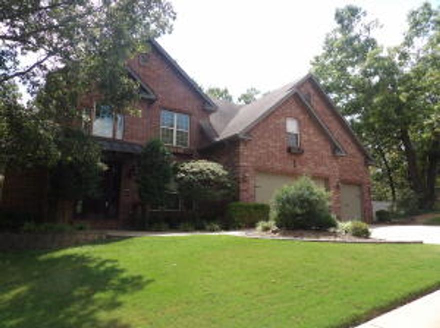 Beautiful contemporary home in Kensington subdivision in Bentonville! Huge incredible family friendly home spread over 3 stories, with 6 bedrooms, 5 full bathrooms, 3 car garage, set on a lot with forested view from deck and screened porch! Lots of natural light from the 2-story great room, and too many amenities to list! BRAND NEW ROOF is being put on by seller!