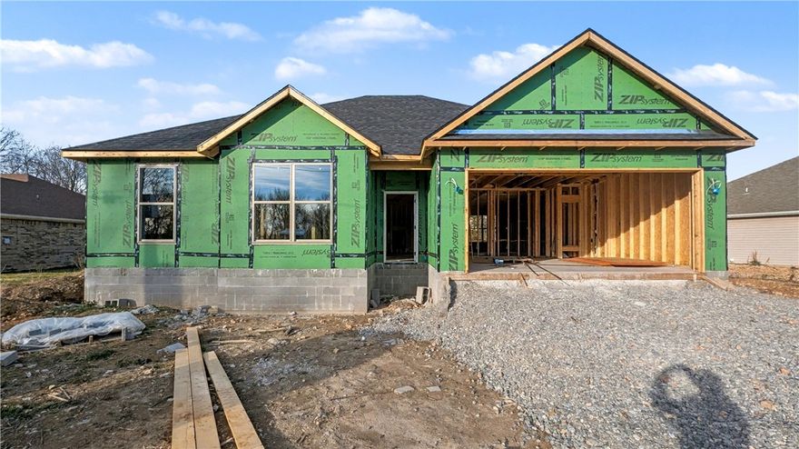 Welcome To Your Next Home! This One Is Just Getting Started And Checks Every Box. It Will Be A Beautiful New Build With Style, Function, And That “Feels Like Home” Energy From The Moment You Walk In. The Vaulted Living Room With Beam Accents Adds Warmth And Character, Flowing Seamlessly Into An Open Kitchen With A Large Island, Quartz Counters, Custom Cabinets, And Great Natural Light. The Split Floor Plan Keeps The Primary Suite Private With A Spacious Bath And Walk-In Closet, While The Additional Rooms Offer Flexibility For Guests, Work, Or Play. Step Outside To A Covered Back Deck Overlooking A Super Flat Backyard, A Rare Find In Bella Vista! Perfect Spot For Kids, Pets, Or Your Future Firepit. Convenient Location With Easy Access To I-49, Shopping, And Dining While Still Offering The Peaceful Setting You’ve Been Looking For. Contract Early To Make Selections. Deeded As 2 Bed Septic. 3rd Room To Be Considered Office/Bonus Or Other Non Sleeping Room. Signed Acknowledgment Of Such Required.