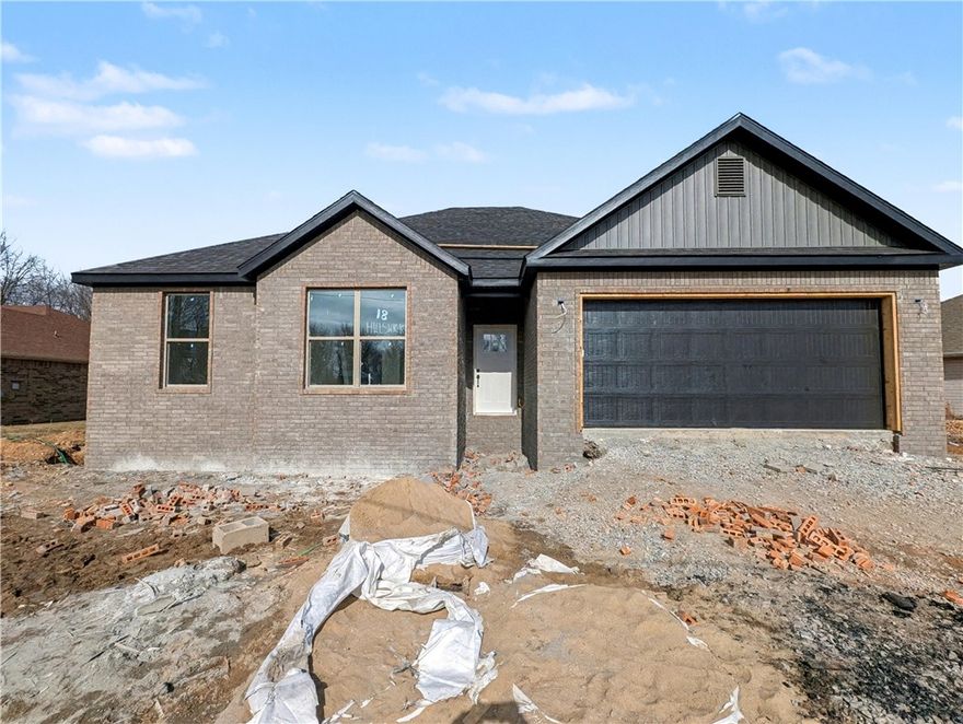 Welcome To Your Next Home! This One Is Just Getting Started And Checks Every Box. It Will Be A Beautiful New Build With Style, Function, And That “Feels Like Home” Energy From The Moment You Walk In. The Vaulted Living Room With Beam Accents Adds Warmth And Character, Flowing Seamlessly Into An Open Kitchen With A Large Island, Quartz Counters, Custom Cabinets, And Great Natural Light. The Split Floor Plan Keeps The Primary Suite Private With A Spacious Bath And Walk-In Closet, While The Additional Rooms Offer Flexibility For Guests, Work, Or Play. Step Outside To A Covered Back Deck Overlooking A Super Flat Backyard, A Rare Find In Bella Vista! Perfect Spot For Kids, Pets, Or Your Future Firepit. Convenient Location With Easy Access To I-49, Shopping, And Dining While Still Offering The Peaceful Setting You’ve Been Looking For. Contract Early To Make Selections. Deeded As 2 Bed Septic. 3rd Room To Be Considered Office/Bonus Or Other Non Sleeping Room. Signed Acknowledgment Of Such Required.