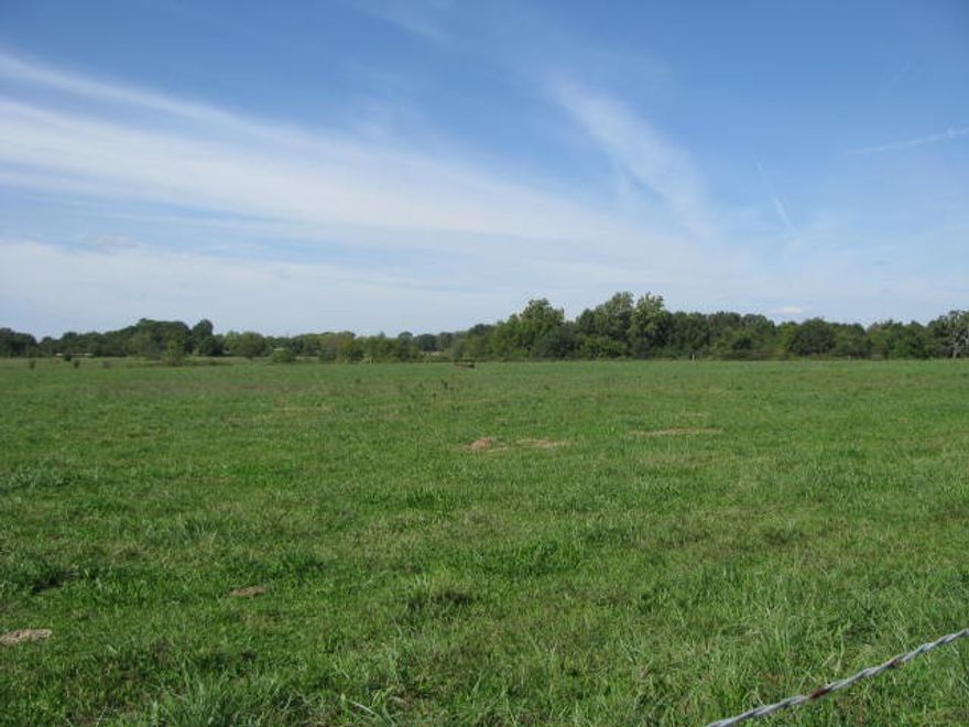 Exceptional development property located off US 49 & HWY 72. next to the New Arkansas Welcome Center (currently under construction). This property includes 2 parcels totaling 27.13 acres in the City limits. Taxes reflect both parcels. City of Gravette approved City Sewer anticipated early 2026. With Commercial C-2 zoning this offers INVESTERS a wide range of development possibilities with unmatched visibility and potential. Excellent access,1123' ft. of HWY 72 frontage, directly off US 49. INVESTERS, you couldn't ask for a better location, whether your planning Retail, Convivence store, Grocery store, Auto dealership, Church, Rec/Center or something entirely unique, this land offers endless potential in the Gravette community. This level cleared land has 2 older rental homes, large barn, and outbuildings. Great opportunity in a prime location for future development. Owner will consider splitting acreage. HWY 72 daily traffic count (11,000). US 49 daily traffic count North & South bound (20,000). Act Now!!