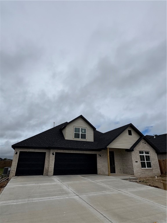 This single-story home invites you in with an open floor plan, vaulted ceilings, and a customized fireplace in the family room. Another room just off entry could be used as a 5th bedroom/flex or office space plus four other spacious bedrooms, three full bathrooms, and generous utility room, laundry, pantry, closets, and a three-car garage. Designer-chosen finishes and details; paint colors, countertops, tile, engineered wood flooring, accent walls, and lighting. It comes with fence, gutters and blinds. The community has a nice pavilion, pool and playground. Situated minutes from I-49, Golf Courses, Winery, Arvest Ballpark, Arkansas Children's Hospital and good restaurants! Lender credits offered with preferred lender. Home is estimated to be completed by July 4th. Schedule your tour today!!
