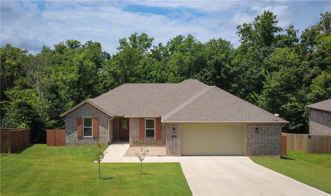 Looking for that peaceful easy feeling? Comfort, space, and convenience meet in this beautiful 3 bedroom, 2 bath all brick home. It boasts a versatile bonus room perfect for an office, study, or hobby space. The split floor plan offers privacy, while porcelain tile flooring flows throughout the home. The bathroom and kitchen are equipped with sleek granite countertops. Take note of the new and immaculate oven and induction stove top. Situated in the tranquil Birsay Subdivision, the property includes a fenced backyard and a spacious 2.5-car garage—perfect for extra storage or a workshop. Located just minutes from I-49 and near the Branchwood Recreation Center, you'll enjoy easy access to all the amenities Bella Vista has to offer, including golf courses, lakes, walking and biking trails, fitness centers, and community clubs.
This home offers natural beauty and modern convenience in one of Northwest Arkansas's most desirable communities. Don’t miss your opportunity to enjoy the Bella Vista lifestyle!