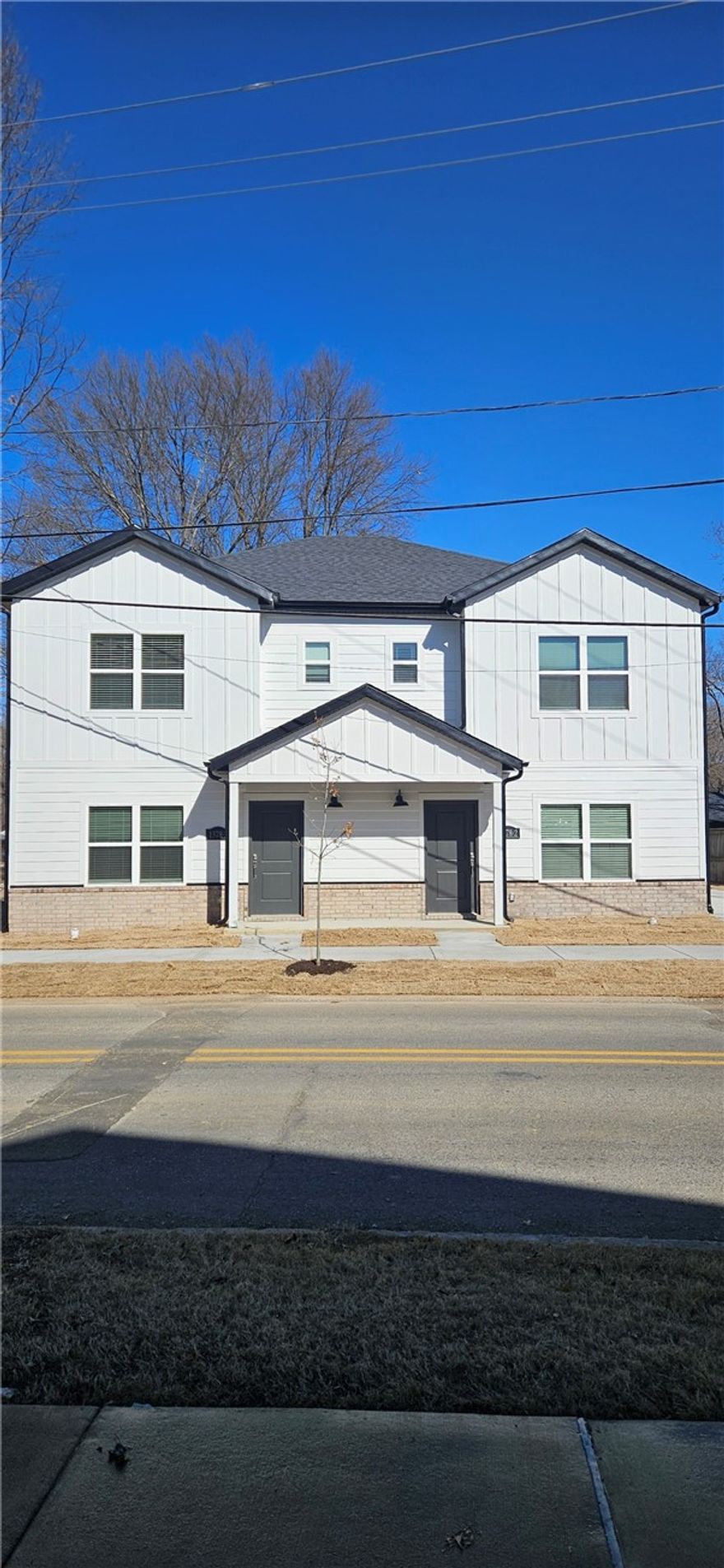 Nice new construction townhomes in Fayetteville.  Home features 3 bedrooms 2.5 bathrooms, wood floors throughout downstairs, SS appliances, covered back porch, all appliances, ceiling fans in bedrooms, master bedroom complete4 with walk-in shower in master bath, and much more.  Come take a look, it won't last long.