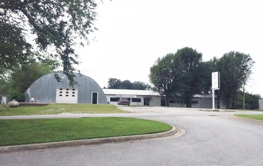 Easy Access to Hwy 71/I-49, Located on the Wishing Springs Trail, which is part of the Razorback Regional
Greenway Trail, Parking for the trail is directly across from the property.  4,800 SF Quonset Hut included