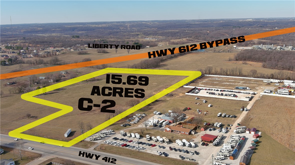 Prime Regional site at NWA’s newest ARDOT construction project of major arteries W 412 and 612 highway merges (contract completion 2027) connecting front door to NWA’s I-49 west access. This excellent site shares 80’ R.O.W. on east boundary to Henri de Tonti, W 412. This property consists of 3 contiguous tracts being 5 acres, 4.69 acres and 4 acres west to east (note parcel numbers). This listing includes the adjoining 2 acres property of C-2 at its south end/ front visible from W 412 Hwy, Henry de Tonti. See MLS# 1275585, and 20 acres/ two 10 acre sites to the north zoned I-1 1275587,1275599, 1275603, 1275612, 1275616 which combined could be part of a multi-tract large acreage opportunity for possible P.U.D. Sewer 2025 (City will bond timing). Topo: Flat to gentle slope. (See support documents for surveys, graphics, and agent for details, tax incentives and additional surrounding acreage information)