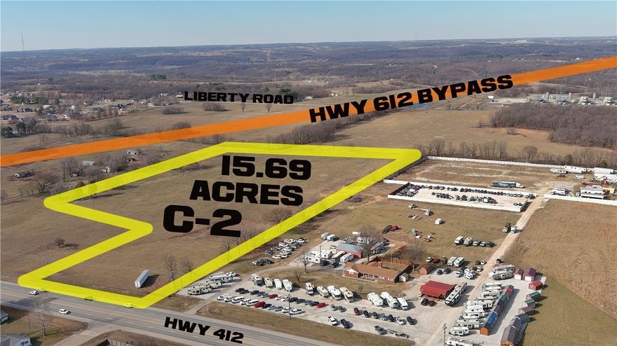 Prime Regional site at NWA’s newest ARDOT construction project of major arteries W 412 and 612 highway merges (contract completion 2027) connecting front door to NWA’s I-49 west access. This excellent site shares 80’ R.O.W. on east boundary to Henri de Tonti, W 412. This property consists of 3 contiguous tracts being 5 acres, 4.69 acres and 4 acres west to east (note parcel numbers). This listing includes the adjoining 2 acres property of C-2 at its south end/ front visible from W 412 Hwy, Henry de Tonti. See MLS# 1275585, and 20 acres/ two 10 acre sites to the north zoned I-1 1275587,1275599, 1275603, 1275612, 1275616 which combined could be part of a multi-tract large acreage opportunity for possible P.U.D. Sewer 2025 (City will bond timing). Topo: Flat to gentle slope. (See support documents for surveys, graphics, and agent for details, tax incentives and additional surrounding acreage information)